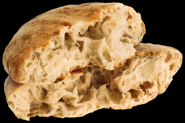 Freshly Fireplace Baked Domestic Traditional Delicious Tender Leavened Pitta Flatbread Torn Loaf Halves Isolated On Black Background