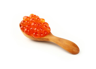 Wooden spoon of red salmon caviar close up