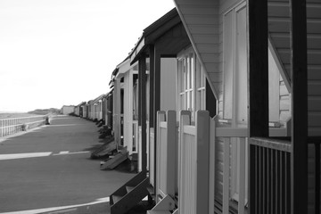 Skegness beach huts black and white image all in a row