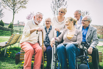 Senior people walking outdoors