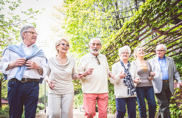 Senior people walking outdoors