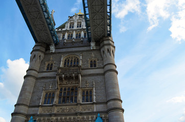 Fototapeta na wymiar Looking upward from the lane to the pedestrian walkways of the Tower Bridge - London, Great Britain