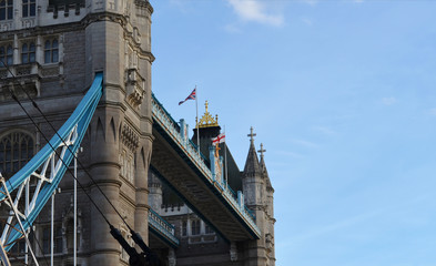 Looking upward from the riverside to the pedestrian walkways of the Tower Bridge - London, Great Britain