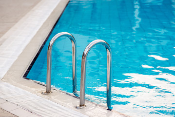 Swimming pool with stair at hotel