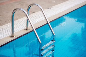 Swimming pool with stair at hotel