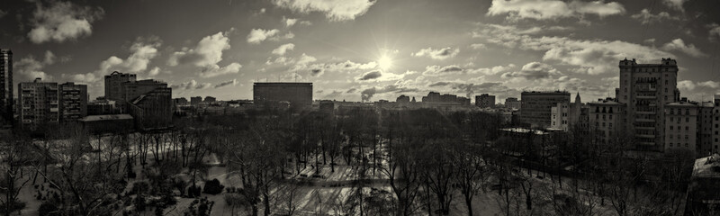 Snowbound deserted city park in the cold winter
