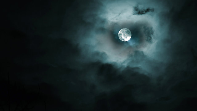 Full Moon And Cloudy Sky