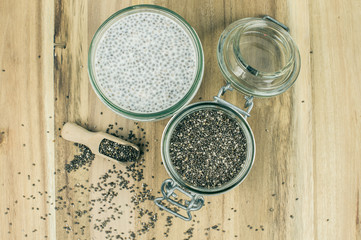 Chia pudding on wooden background, top view