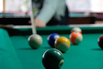 Billiard chelk and pool table background.