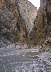 Fethiye. Turkey.Canyon Saklikent. river at the bottom of the canyon in the rays of the rising sun