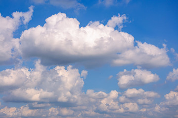 Naklejka na ściany i meble Cumulus clouds with blue sky