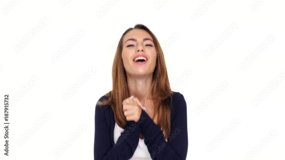 Canvas Prints shocked happy brunette woman looking at the camera and rejoice over white background