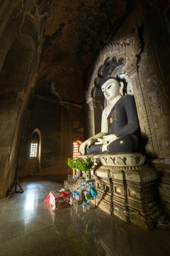 Burmese style Buddha statue in Bagan, Myanmar.