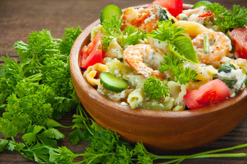  delicious gigli t with shrimps and basil on  plate