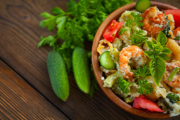  delicious gigli t with shrimps and basil on  plate