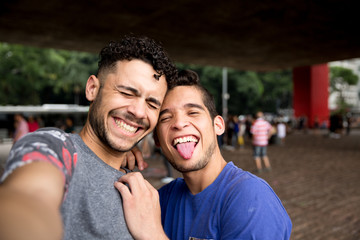 Homosexual couple talking a selfie
