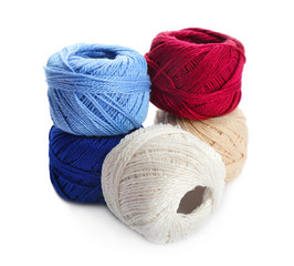 Colorful threads on white background