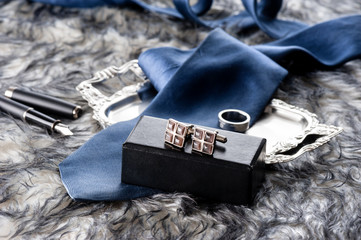 shiny cufflinks with gemstones