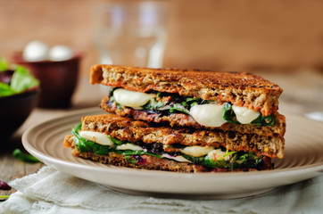 Fresh green mozzarella grilled rye sandwich