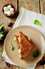 Fresh green mozzarella grilled rye sandwich
