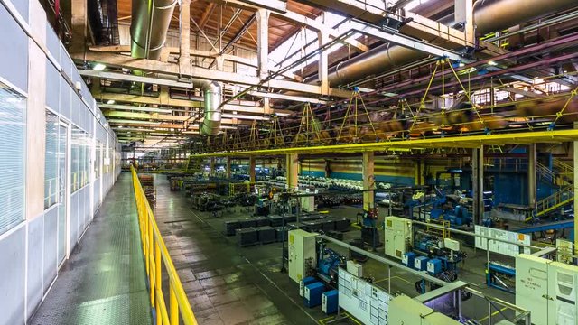Time Lapse Workers Perform Tire Production Process in Plant