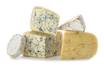 Different kinds of delicious cheese on white background