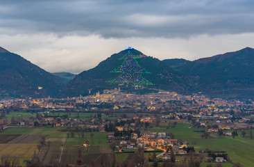 Fototapeta na wymiar Gubbio (Italy) - One of the most beautiful medieval towns in Europe, in the heart of the Umbria Region, central Italy. Here the biggest Christmas tree in the world.
