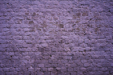 Old vintage brick wall light purple