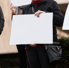 Protester Holding a Blank Sign