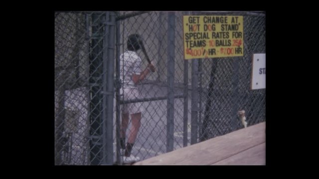 12 year old  Boy in batting cage