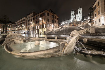 Naklejka premium Spanish Steps and Barcaccia fountain at night, Rome - Italy - Christmas time
