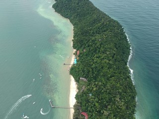 Aerial view of Manukan Island of Sabah, Malaysia. Clear green ocean. Manukan Island is the most...