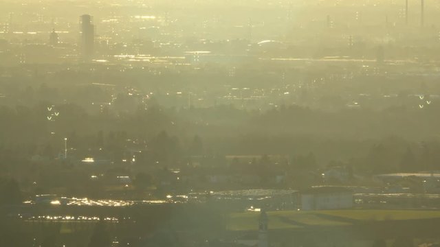 Urban area near Milan, Italy at sunset from far away. Aerial View