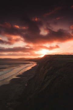 sunset in point reyes red cliffside © Abraham