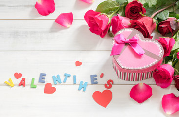 pink gift box and valentine's text