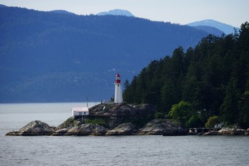 Fototapeta na wymiar Seascape with Point Atkinson Lighthouse, Canada