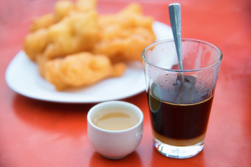 raditional coffee with Chinese breadstick.