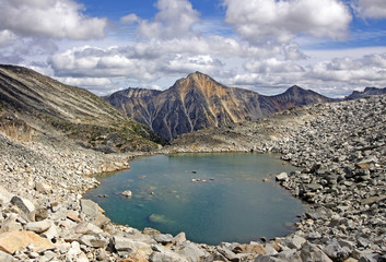 Beautiful alpine lake in Downton Creek Area (Coast Mountains of British Columbia, Canada). Melvin Peak in the background.