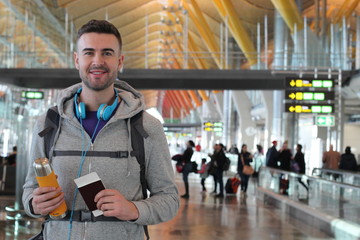 Young traveler ready for an adventure at the airport 
