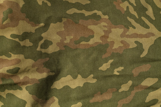 Military uniform pattern with blur effect.