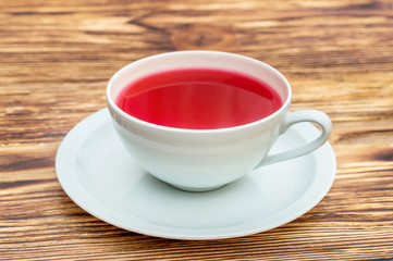 Cup of tea on the wooden table.