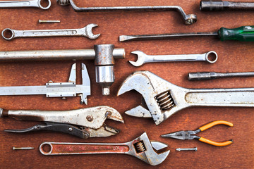 Working tools on wooden table background. top view