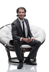 businessman sitting in a comfortable big chair