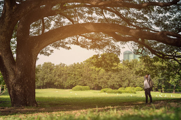 man relaxing in nature park.