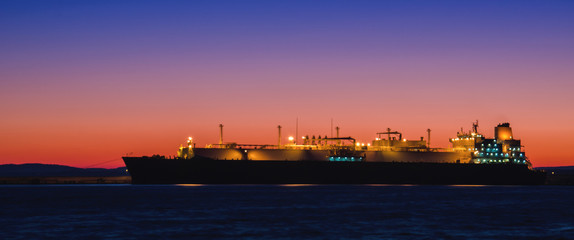 GAS CARRIER - Tanker at the wharf in the harbor at dawn   © Wojciech Wrzesień