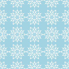 White floral seamless design on blue background