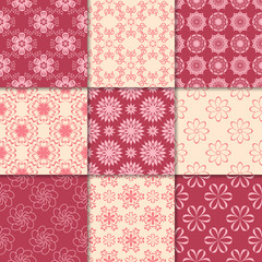 Cherry red and beige floral ornaments. Collection of seamless patterns