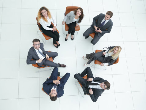 successful business team sitting in a circle