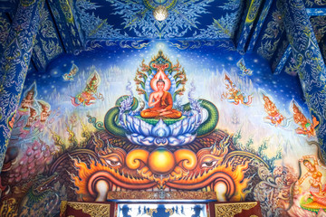 Very beautiful buddhist mural painting in the chapel of Wat Rong Sua Ten or Rong Sua Ten temple. This place is the popular attraction for Chiang Rai trip.