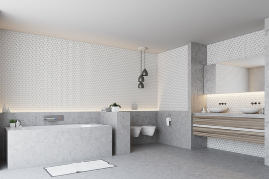 White bathroom corner, gray tub